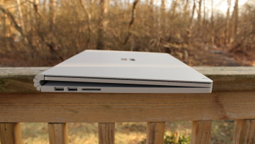 Surface Book 2 on wooden railing