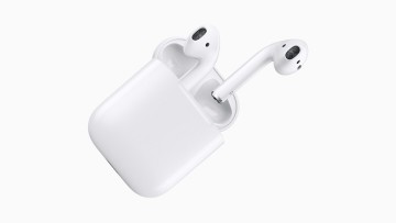 Apple AirPods popping out from their charging case