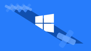 Windows logo with band aid symbols patches on a sky blue background