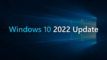 The stock Windows 10 wallpaper with the 2022 Update sign