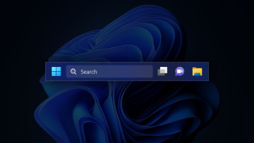 An image showing a portion of Windows 11 taskbar with the new search box