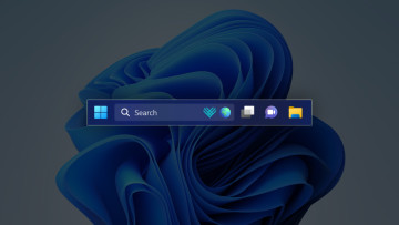 Windows 11 taskbar with the search box and search highlights